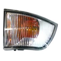 Capuchon indicateur sur le capuchon jaune droit dans le rétroviseur