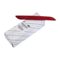 Réflecteur arrière gauche sur le pare-chocs