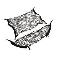 Filet à bagages dans le plancher du coffre